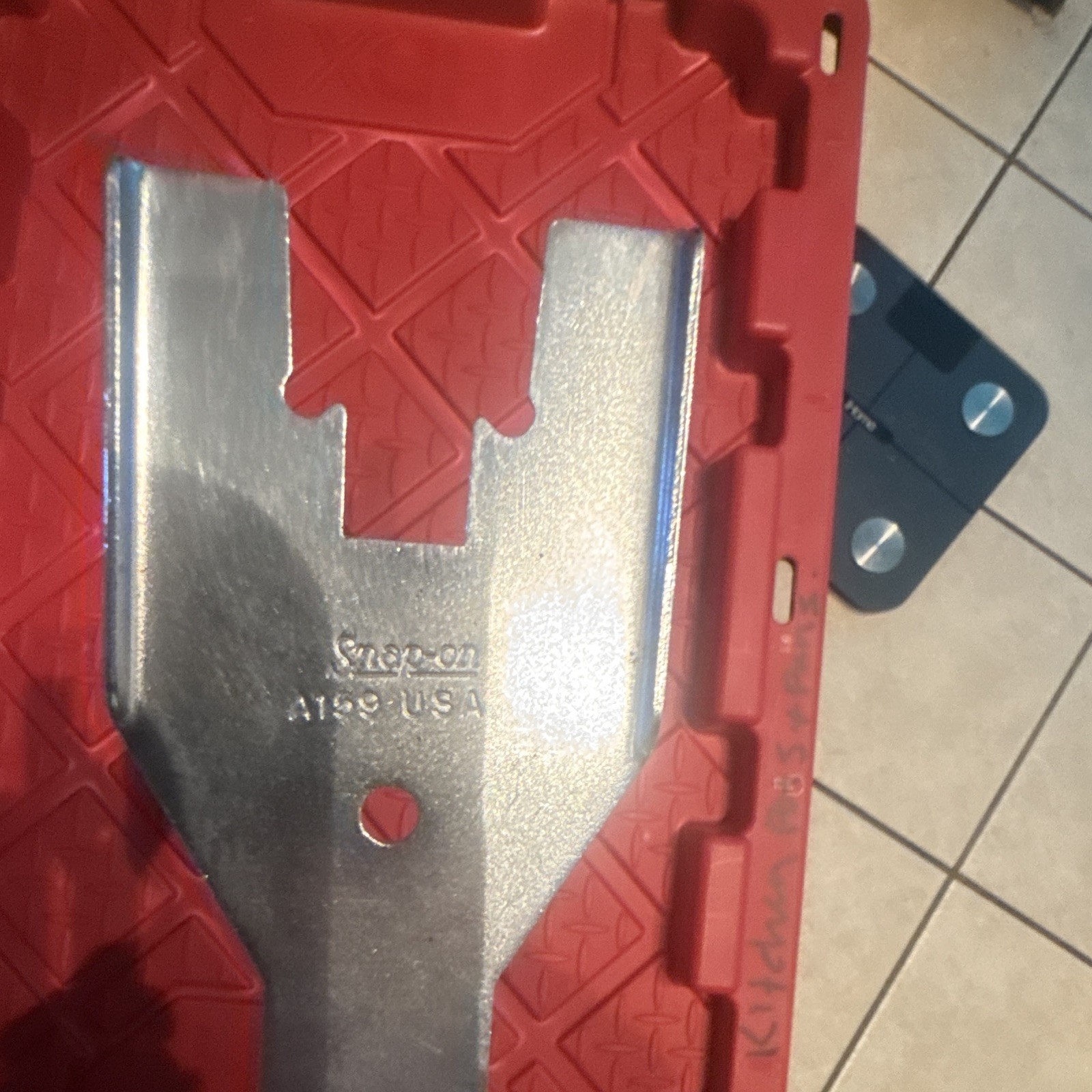 This is a Snap-on A159 door handle panel removal tool.