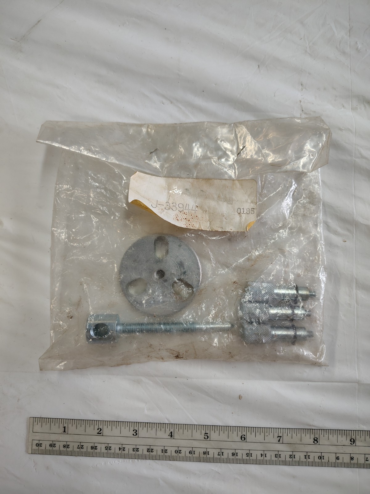 Kent-Moore J-33944 A/C Compressor Clutch Plate Remover – R-Car (Geo Spectrum)
